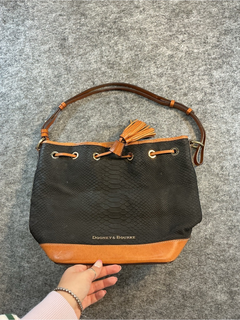 Dooney & Bourke Black with Brown Trim Drawstring Shoulder Bag